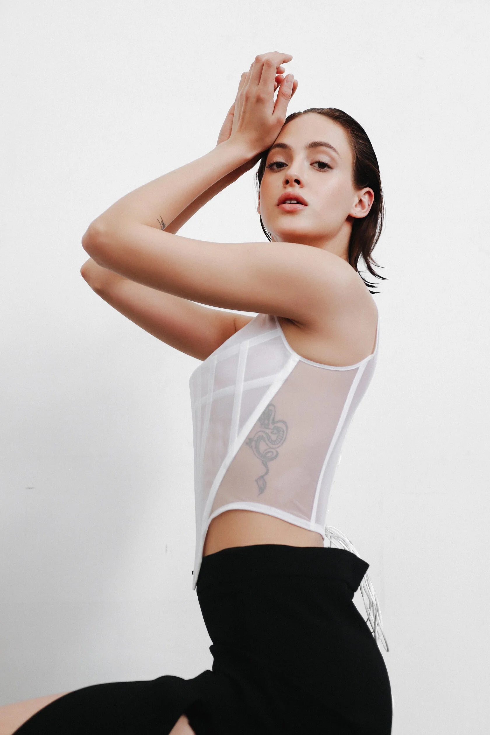 Corset T-shirt made of mesh with a stripe on the chest with laces